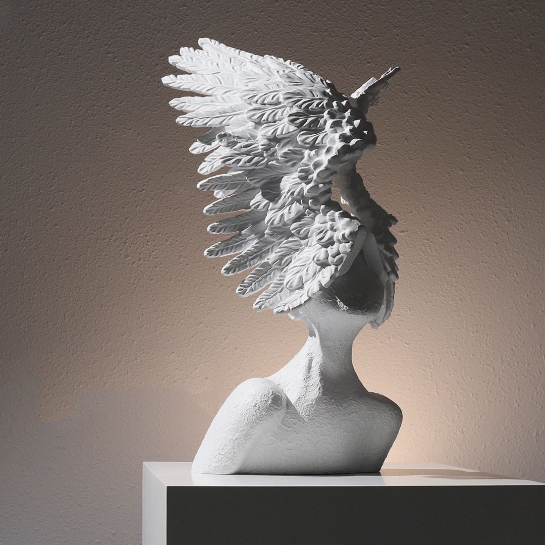 Simple and modern luxury figure sculpture ornaments, wings, and portrait sculpture (white)