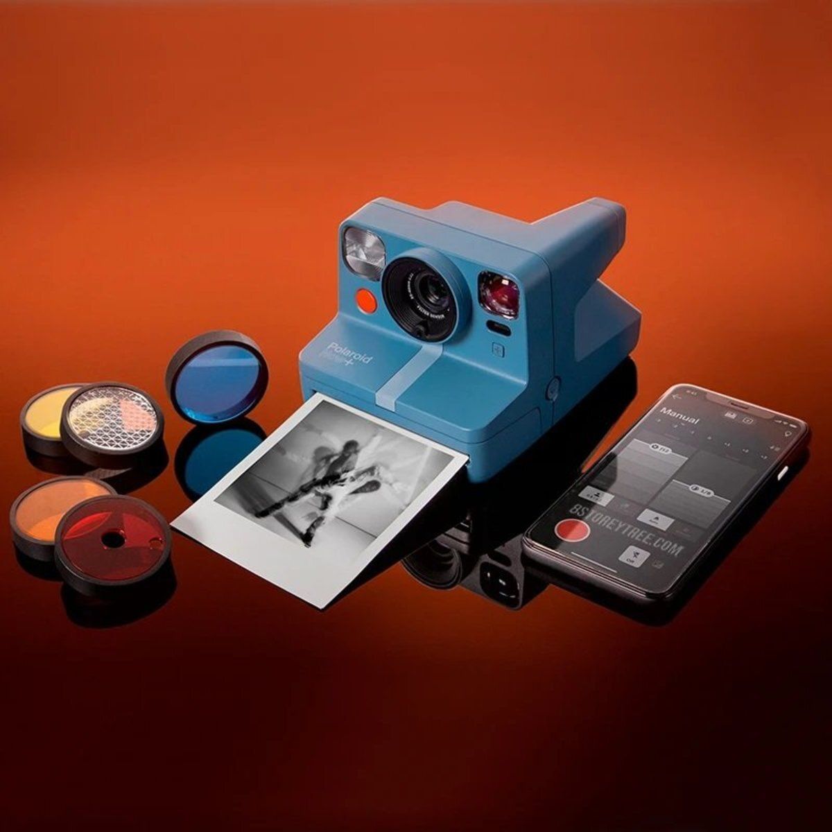 a blue polaroid camera