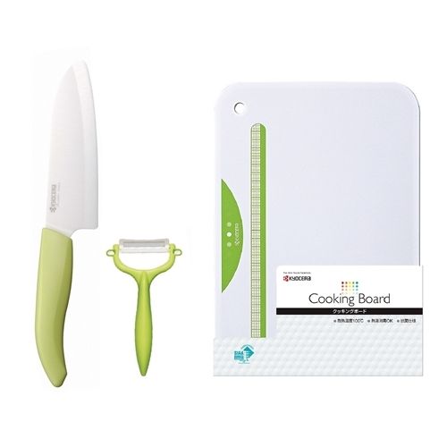 2 Kyocera ceramic knives 11 & 14cm + peeler + board